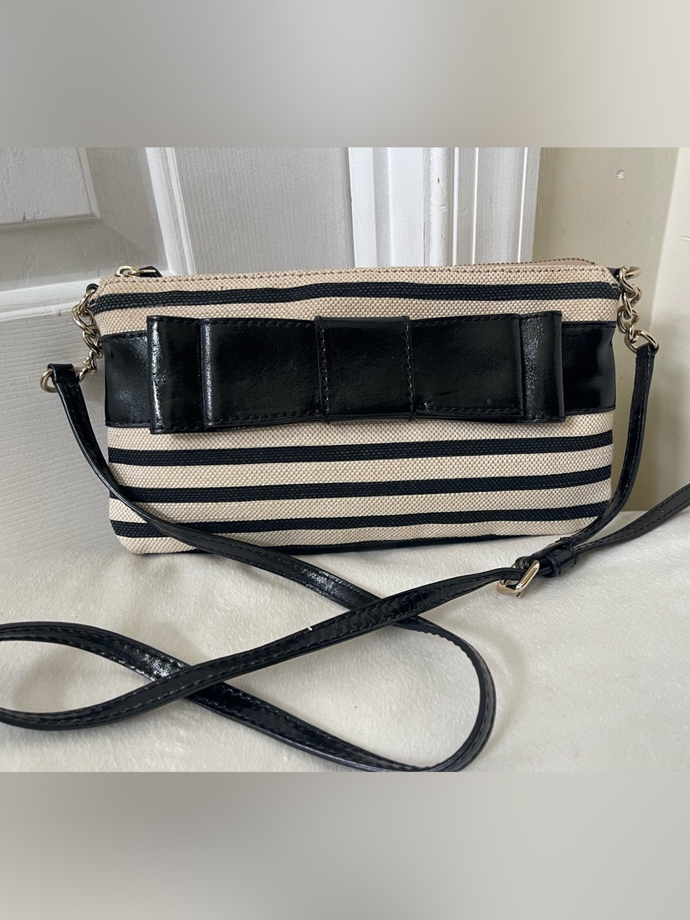 kate spade Black and Cream Striped Crossbody with Bow Detail